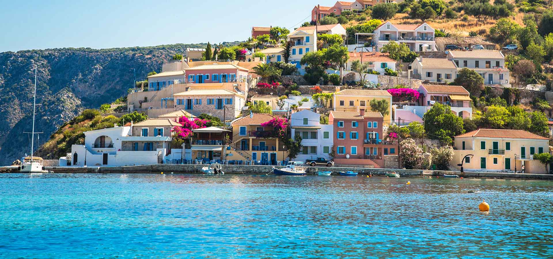 Greek Island Kefalonia. Assos Cityscape. Colored Houses On The G